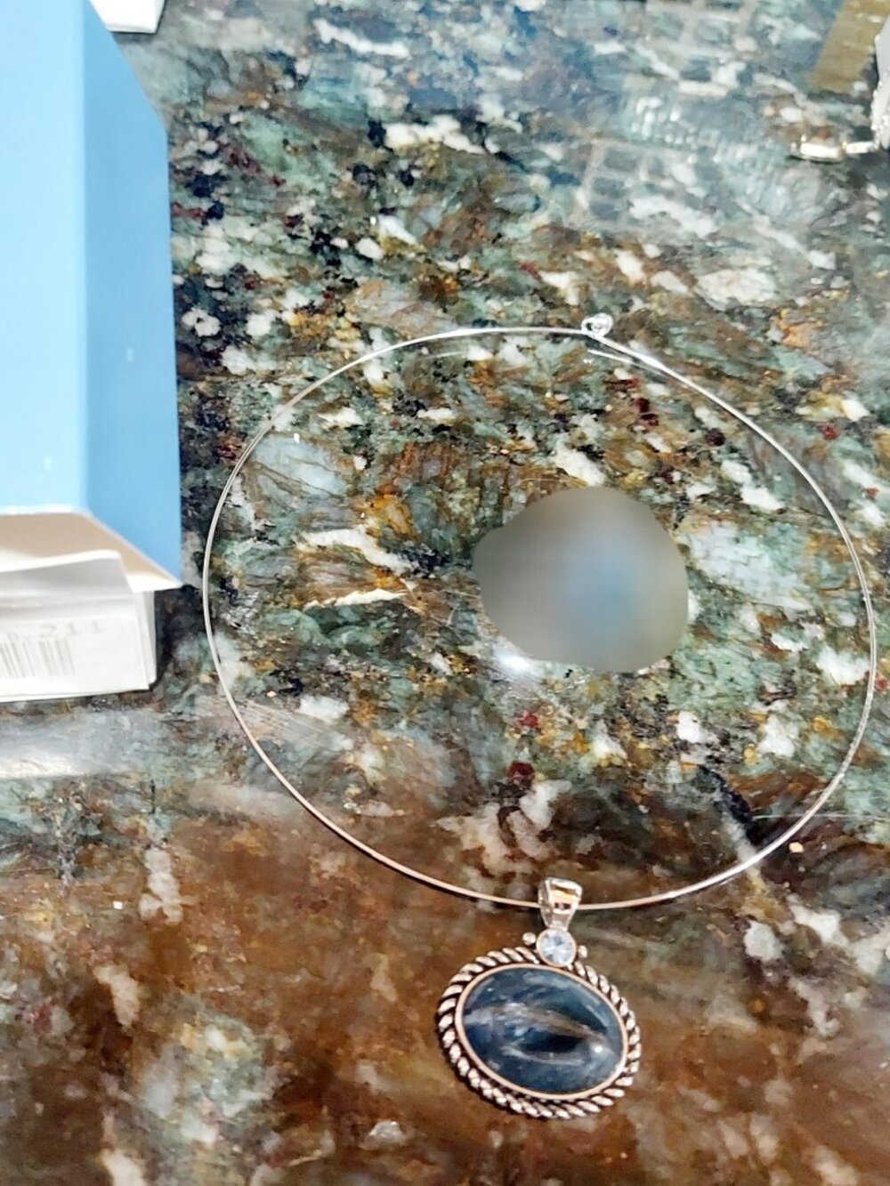 Silver choker necklace with blue stone